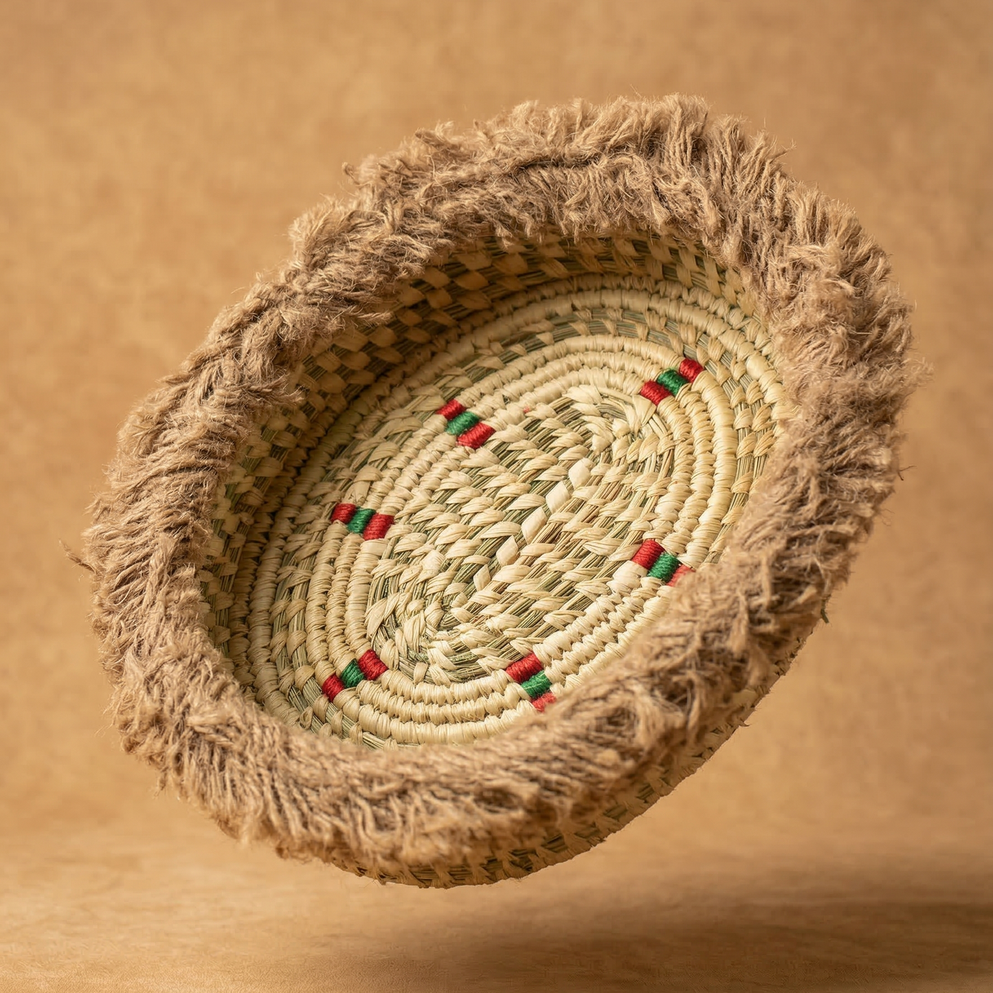 Handwoven basket with decorative elements on a brown background