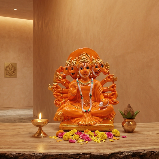 Vibrant orange Panchmukhi Hanumanji murti with five divine faces and ten arms, seated on a wooden platform with diya and kalash