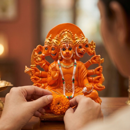 Orange Panchmukhi Hanumanji murti with five divine faces and ten arms being worshipped in Home temple