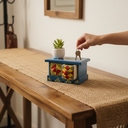 Blue wooden storage chest with hand-painted ceramic drawers