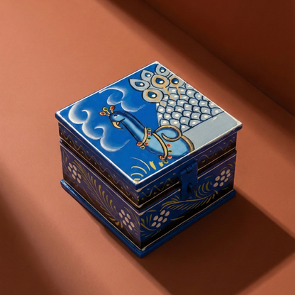 Hand-painted wooden jewelry box featuring vibrant indian folk art of peacock.