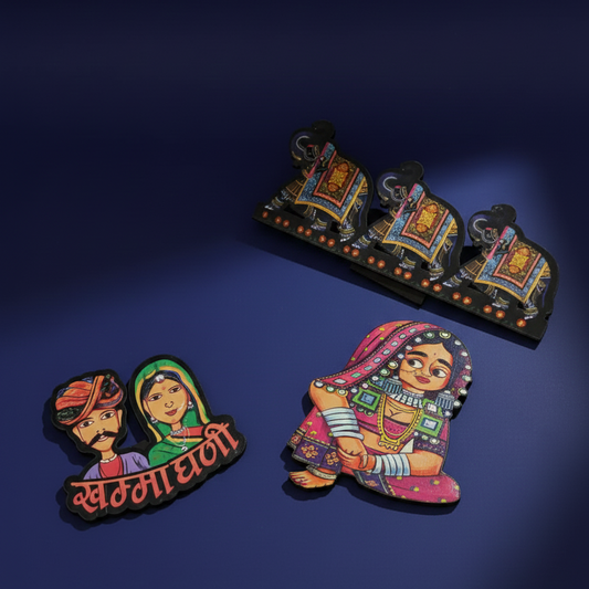 Set of 3 printed wooden fridge magnets featuring a Rajasthani couple, elephants, and a woman in traditional attire on a blue background.