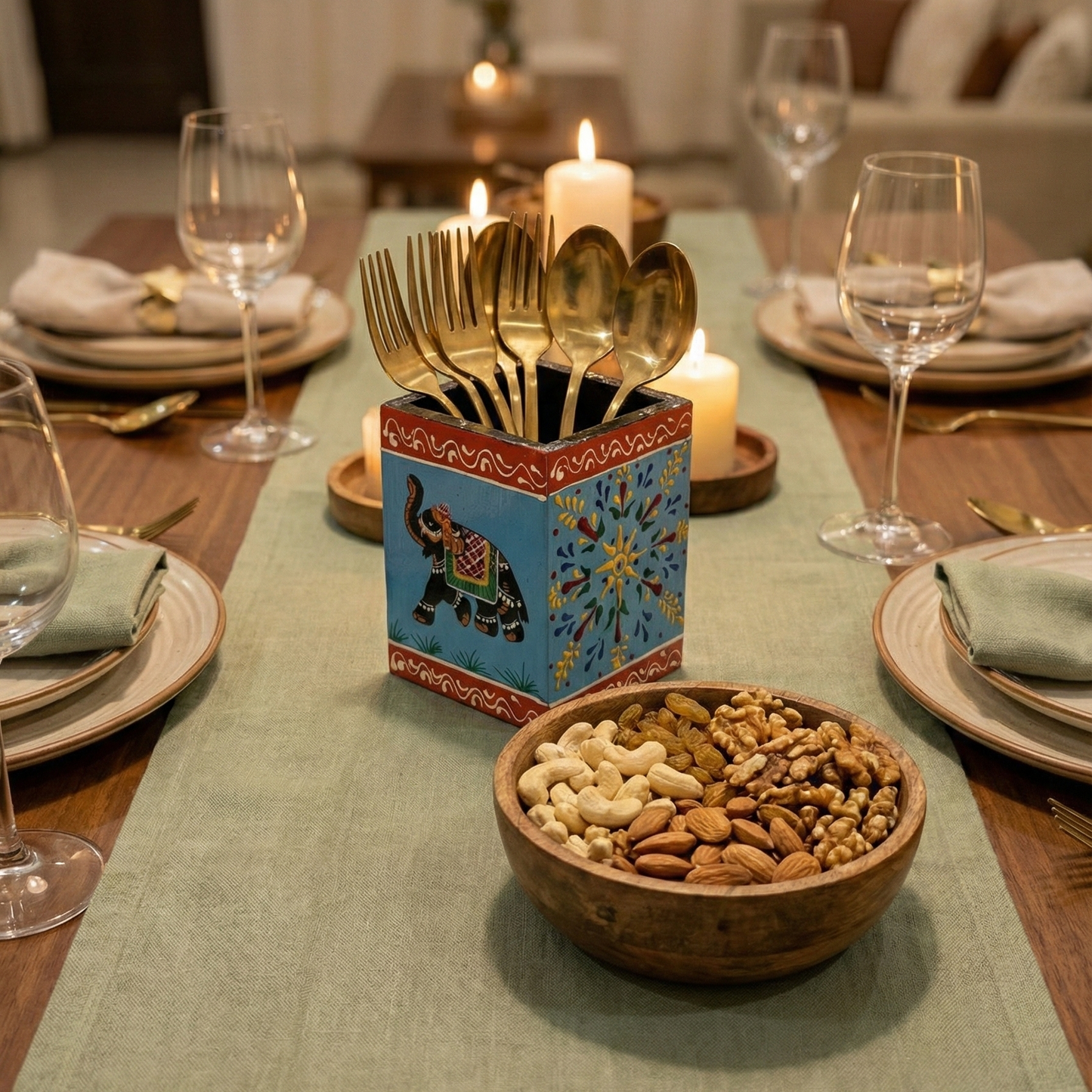 Wooden cutlery holder and spoon stand for dining table featuring a blue hand-painted elephant design with ethnic borders.