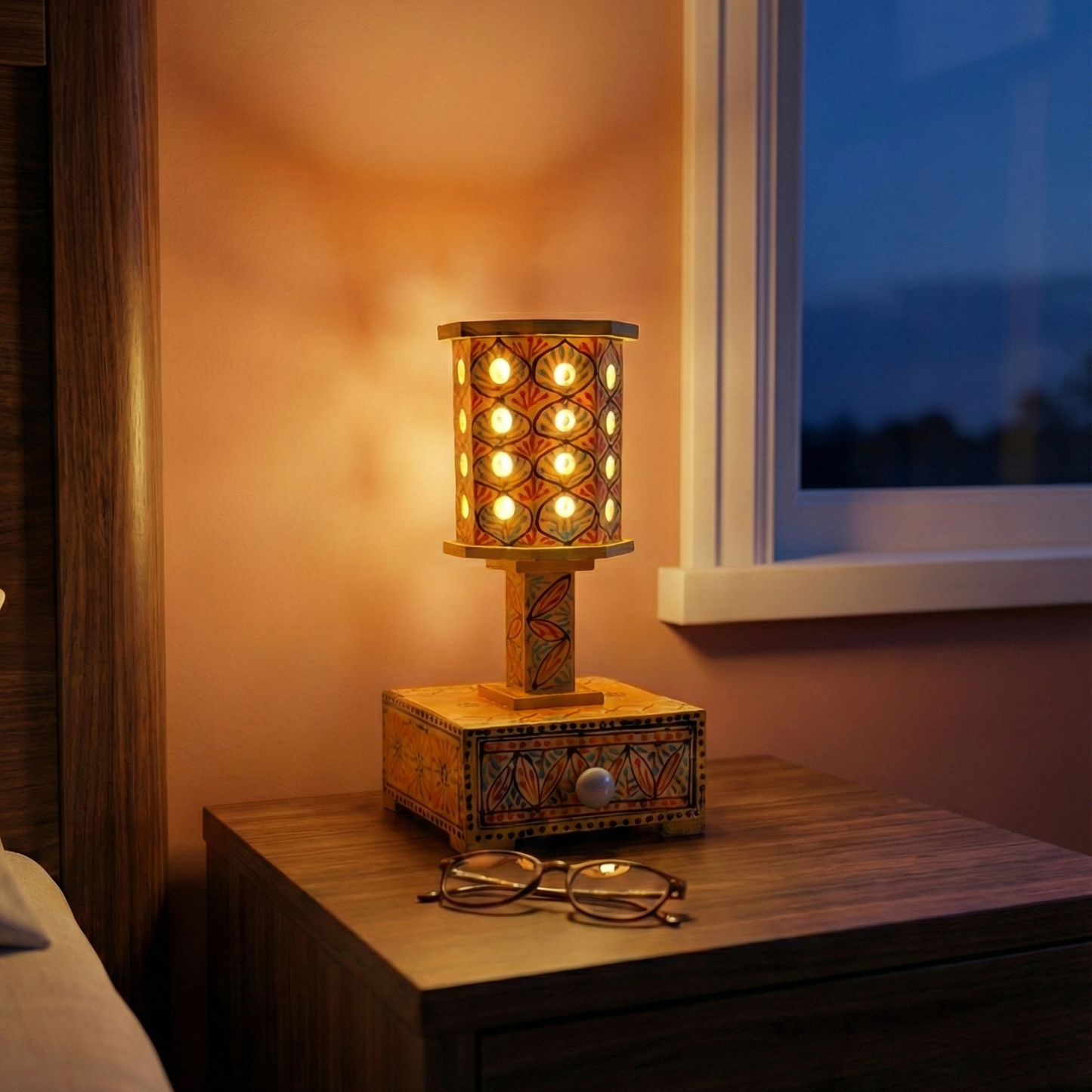 Bright yellow bedside table lamp placed on a wooden nightstand, adding a pop of color to a modern bedroom interior.